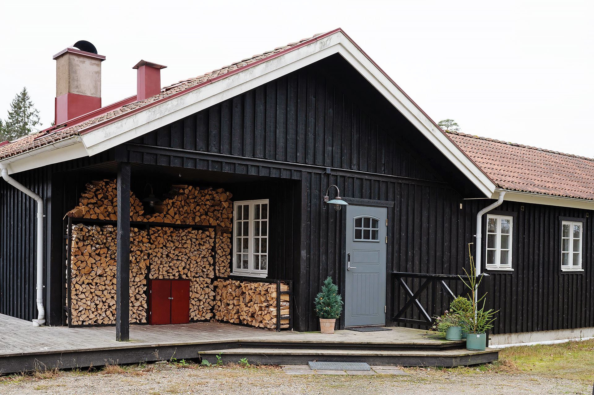 façade maison en bois couleur vert sapin