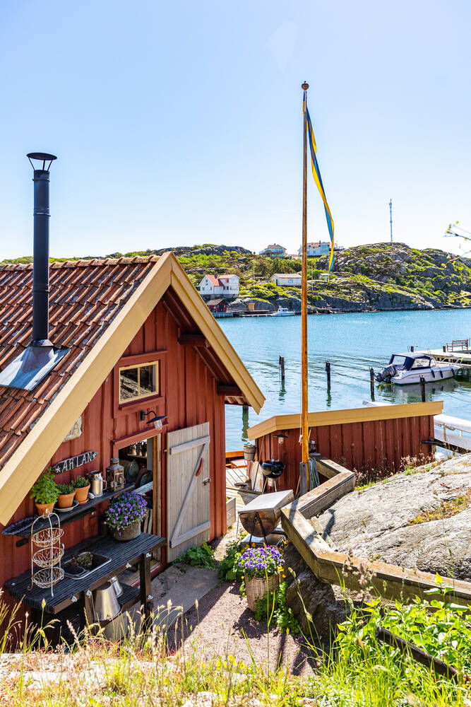 maison en bois rouge Suède