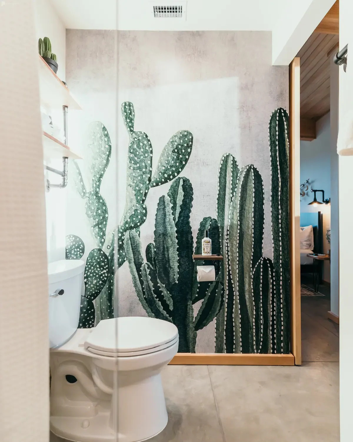 Toilet with cactus wallpaper