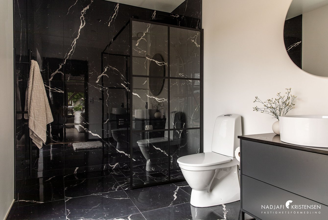 black marble bathroom with contemporary decoration