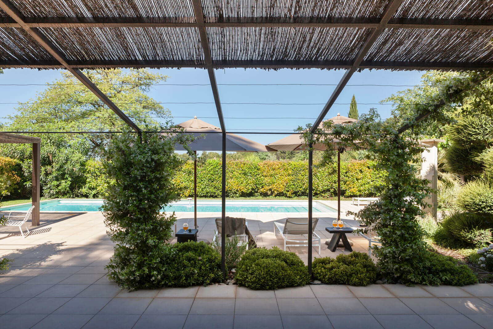 terrace with pergola and swimming pool, contemporary Provencal house