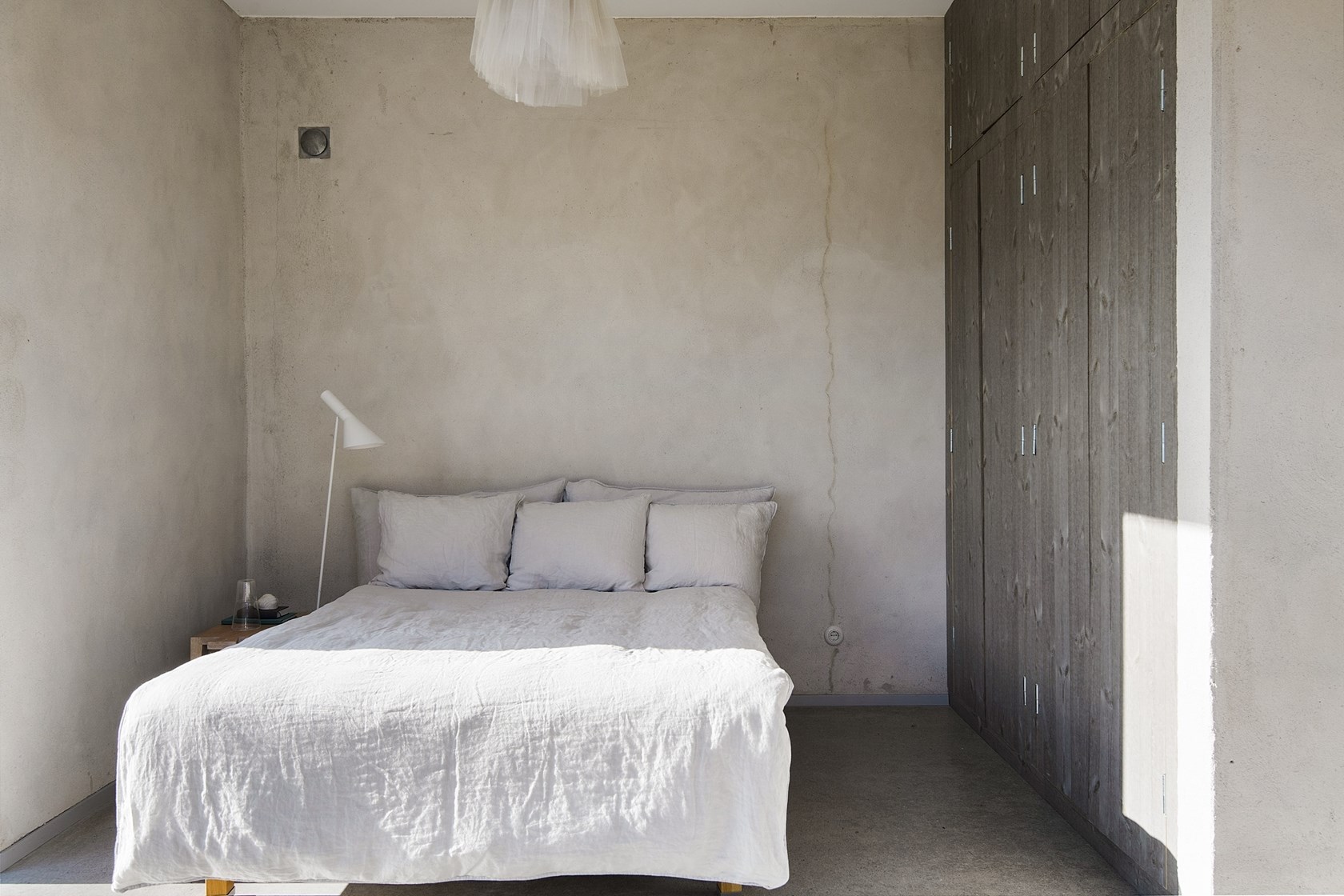 minimalist paneled bedroom wall