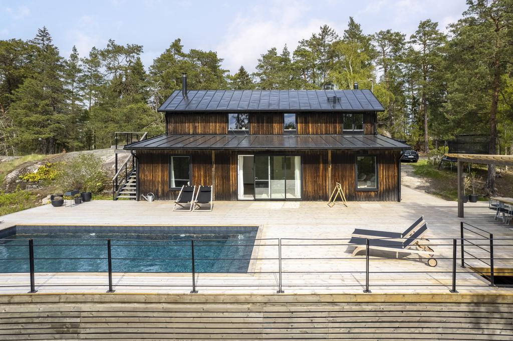 maison en bois avec piscine Suède