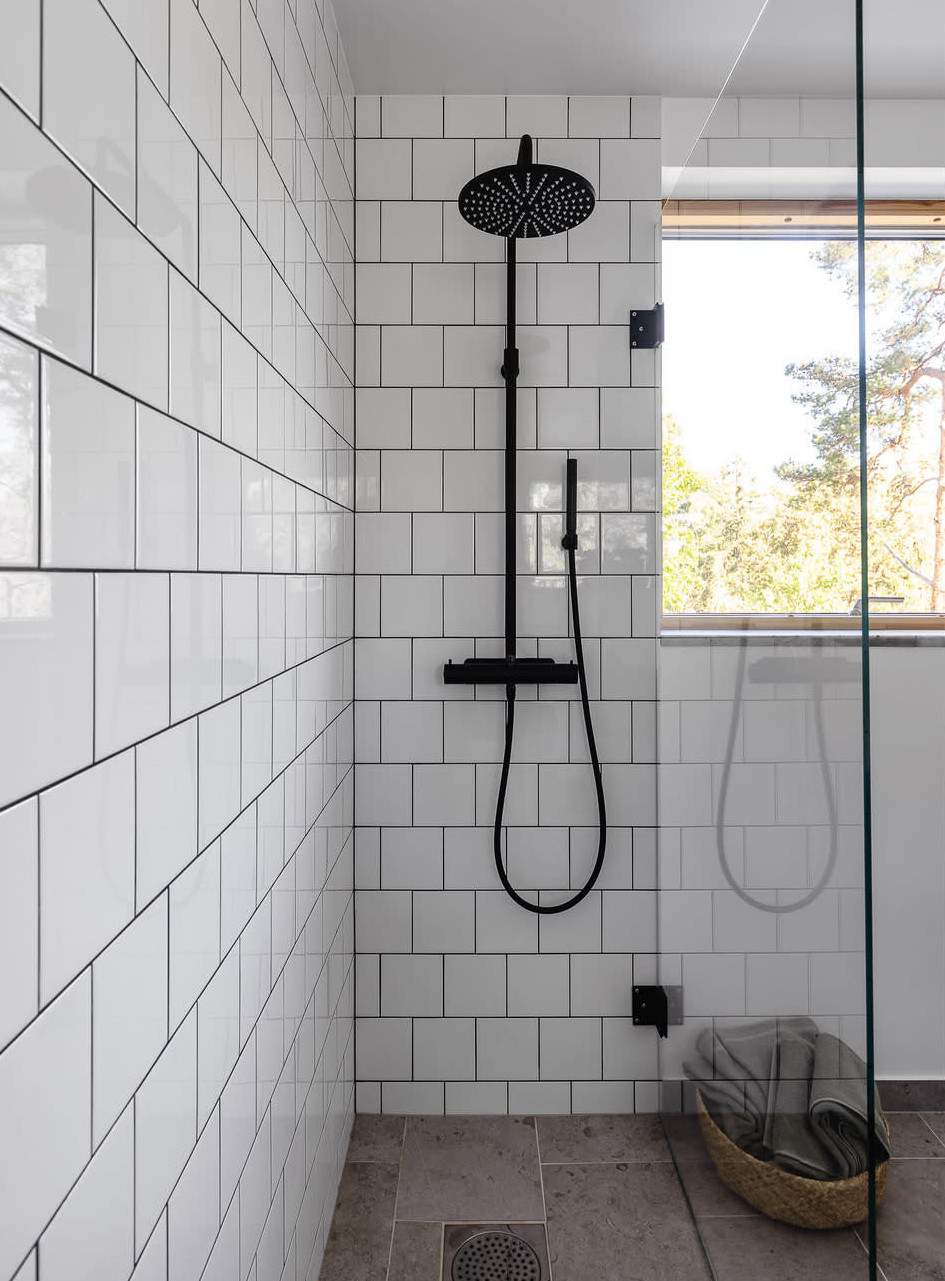 shower with white tiles