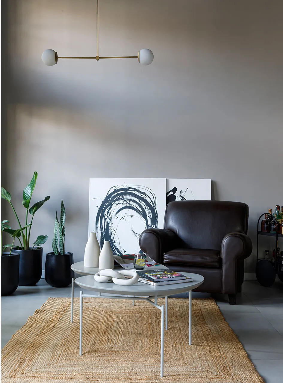 sala de estar con sillón club de cuero