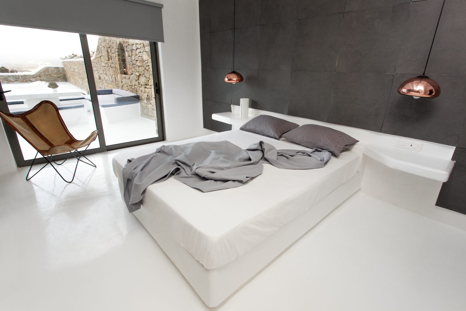 chambre minimaliste maison avec piscine Mykonos